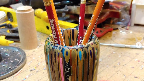 Pencils carved into a cup - now holding Pencils with Epoxy Resin