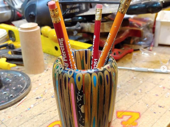 Pencils carved into a cup - now holding Pencils with Epoxy Resin